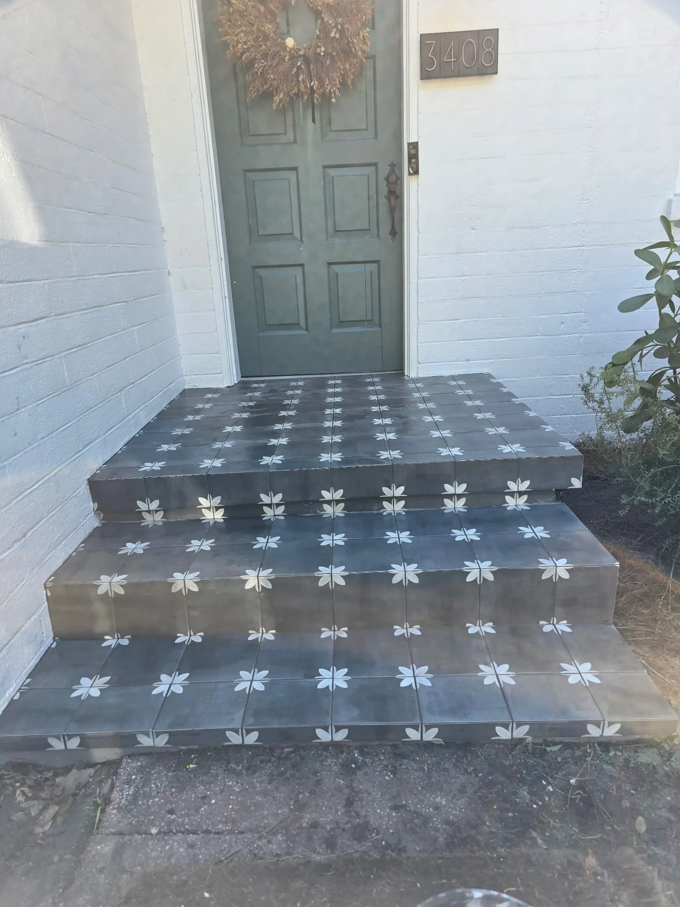 Paver steps leading to a home entry